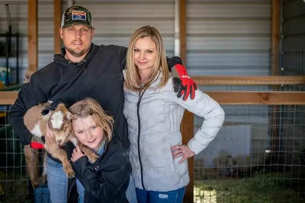 Trent and Jackie with their goats